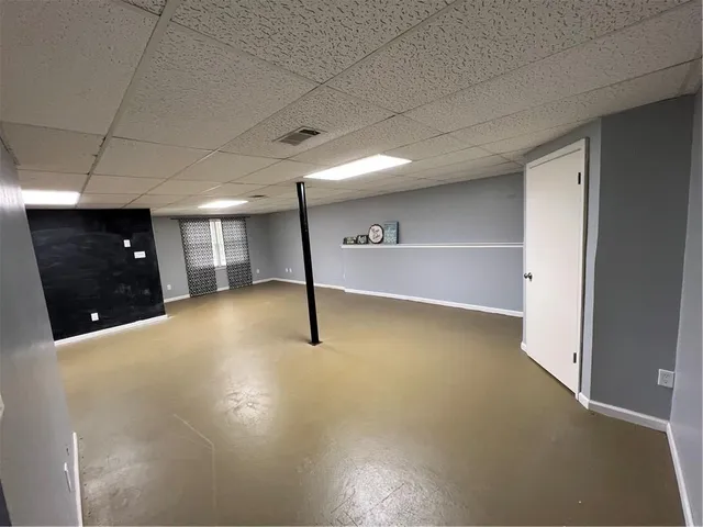 a view of a backyard of the house