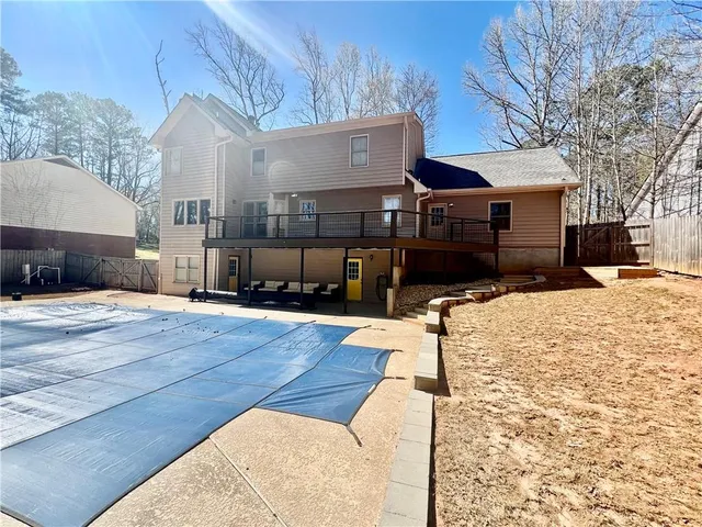 an aerial view of a house and garden