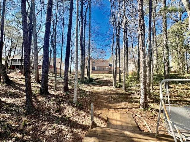 $399,000 | 4811 West Lake Drive Southeast, Conyers, GA 30094