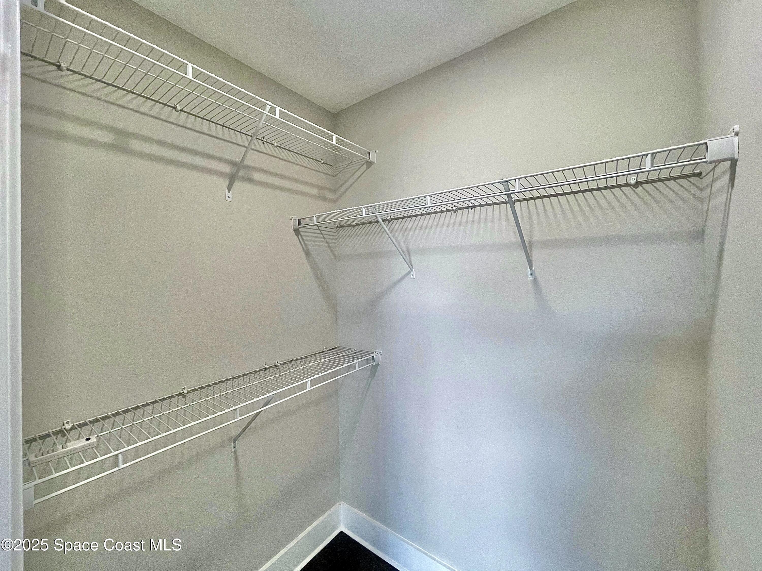 890 Florida Avenue Cocoa, FL 32922 - Photo 18 of 63 a view of a room with racks on the wall