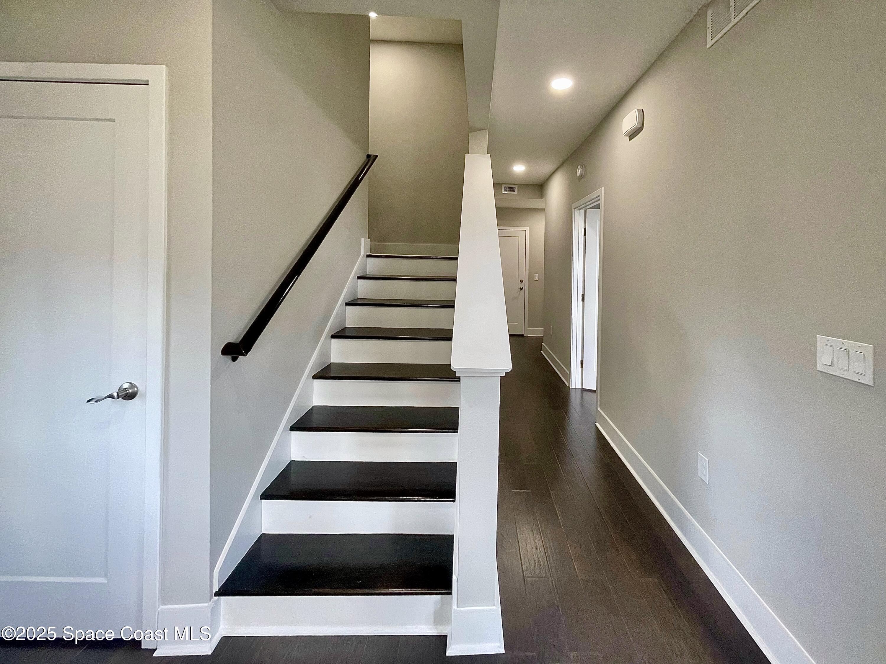 890 Florida Avenue Cocoa, FL 32922 - Photo 25 of 63 a view of entryway with wooden floor and windows