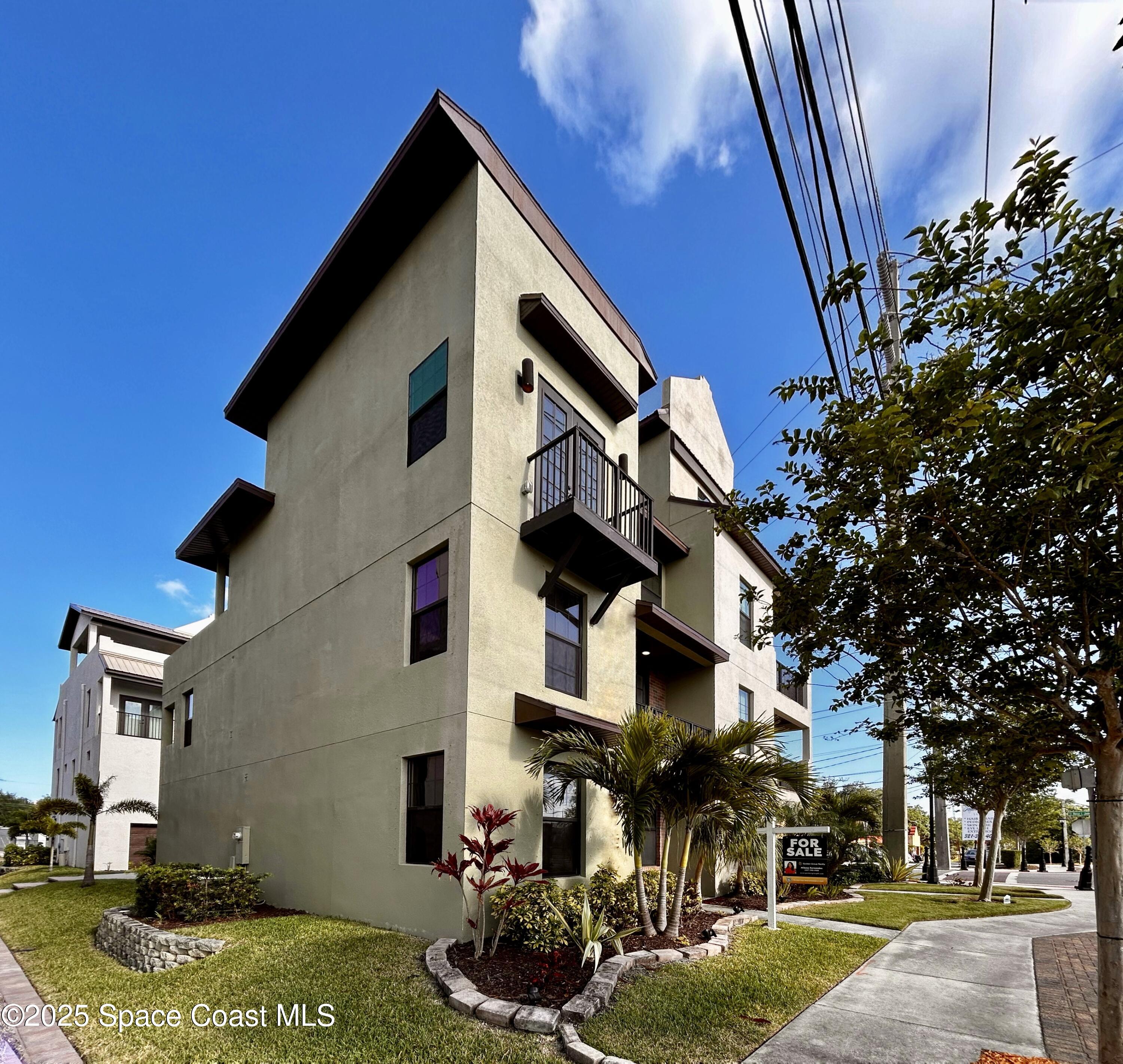 890 Florida Avenue Cocoa, FL 32922 - Photo 3 of 63 a view of a house with a yard