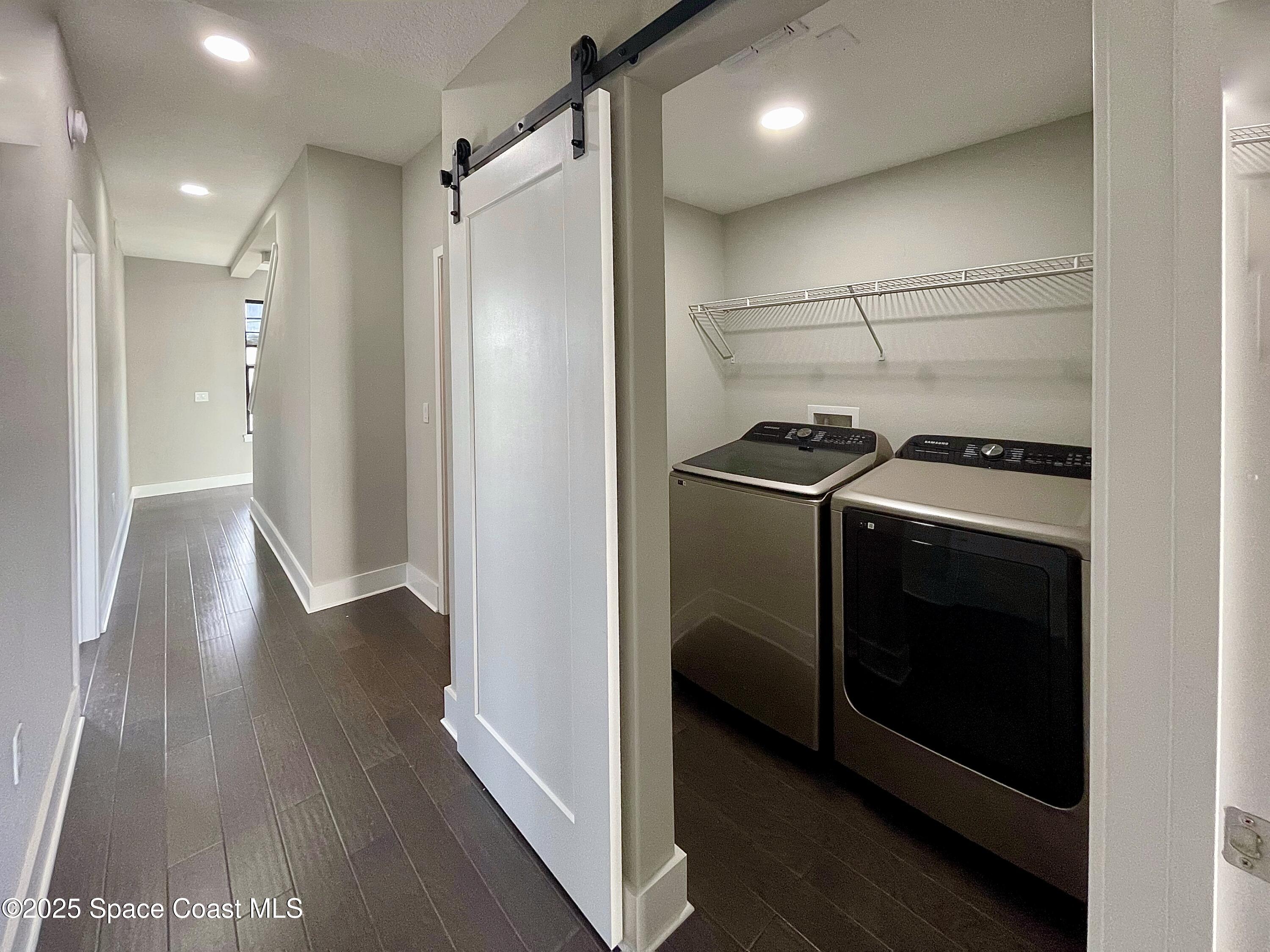 890 Florida Avenue Cocoa, FL 32922 - Photo 34 of 63 a view of a kitchen with a stove wooden cabinets and wooden floor