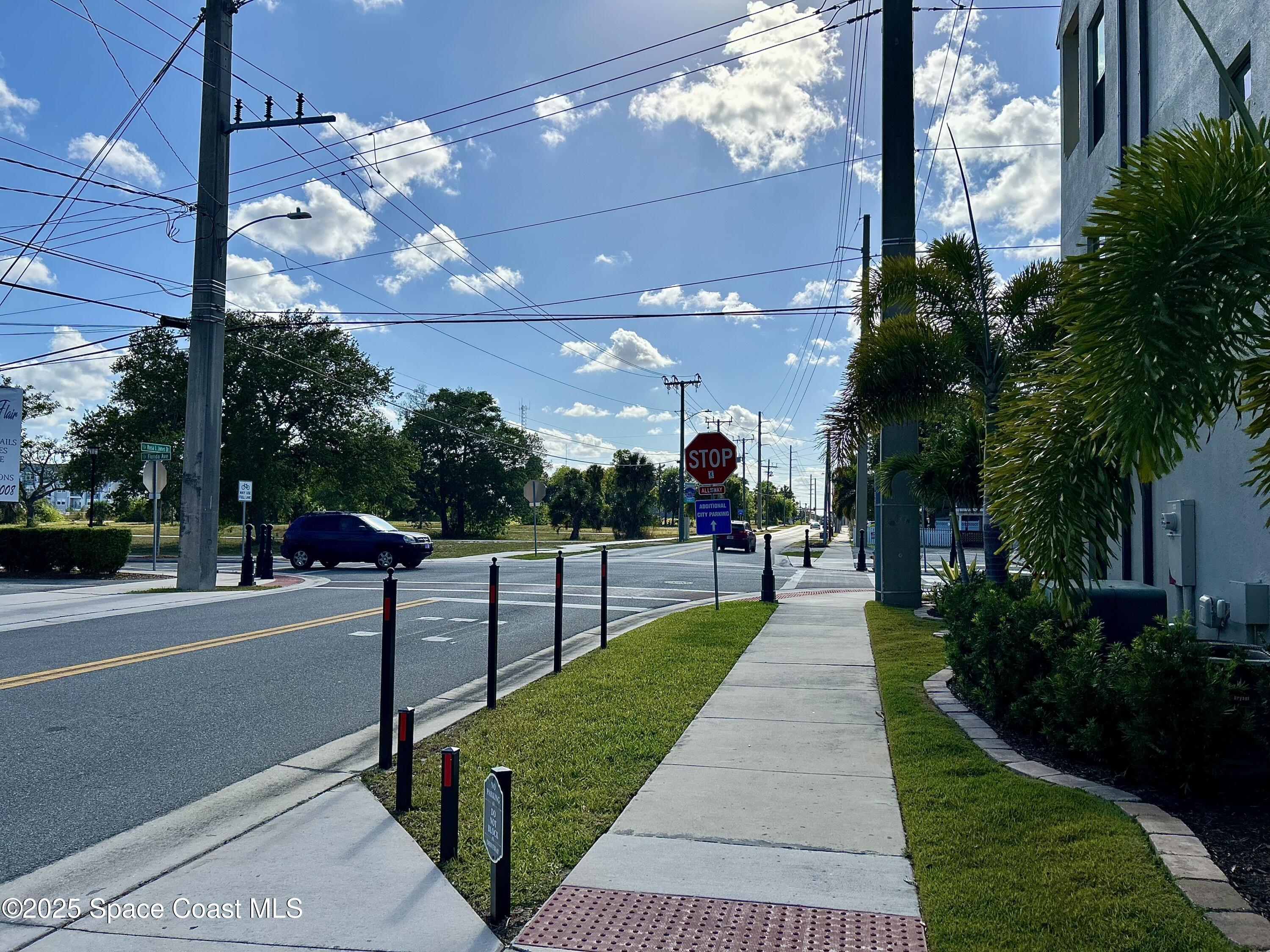 890 Florida Avenue Cocoa, FL 32922 - Photo 50 of 63 a view of a patio with couches and table with potted plants