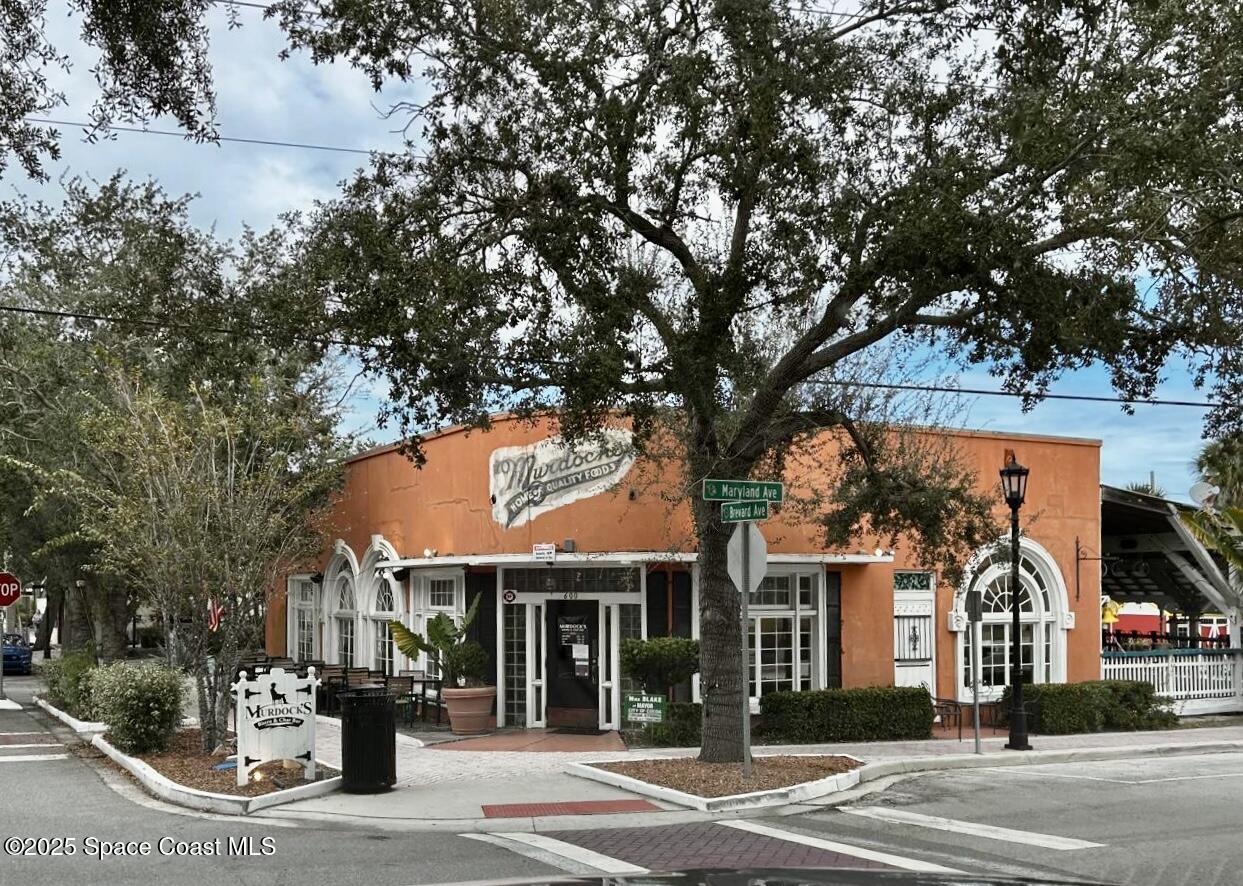 890 Florida Avenue Cocoa, FL 32922 - Photo 53 of 63 a front view of a house with a garden