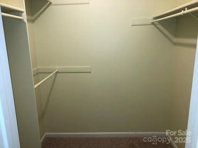 a view of small space with racks on the wall