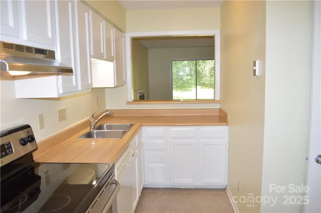 a bathroom with a sink and a bathtub