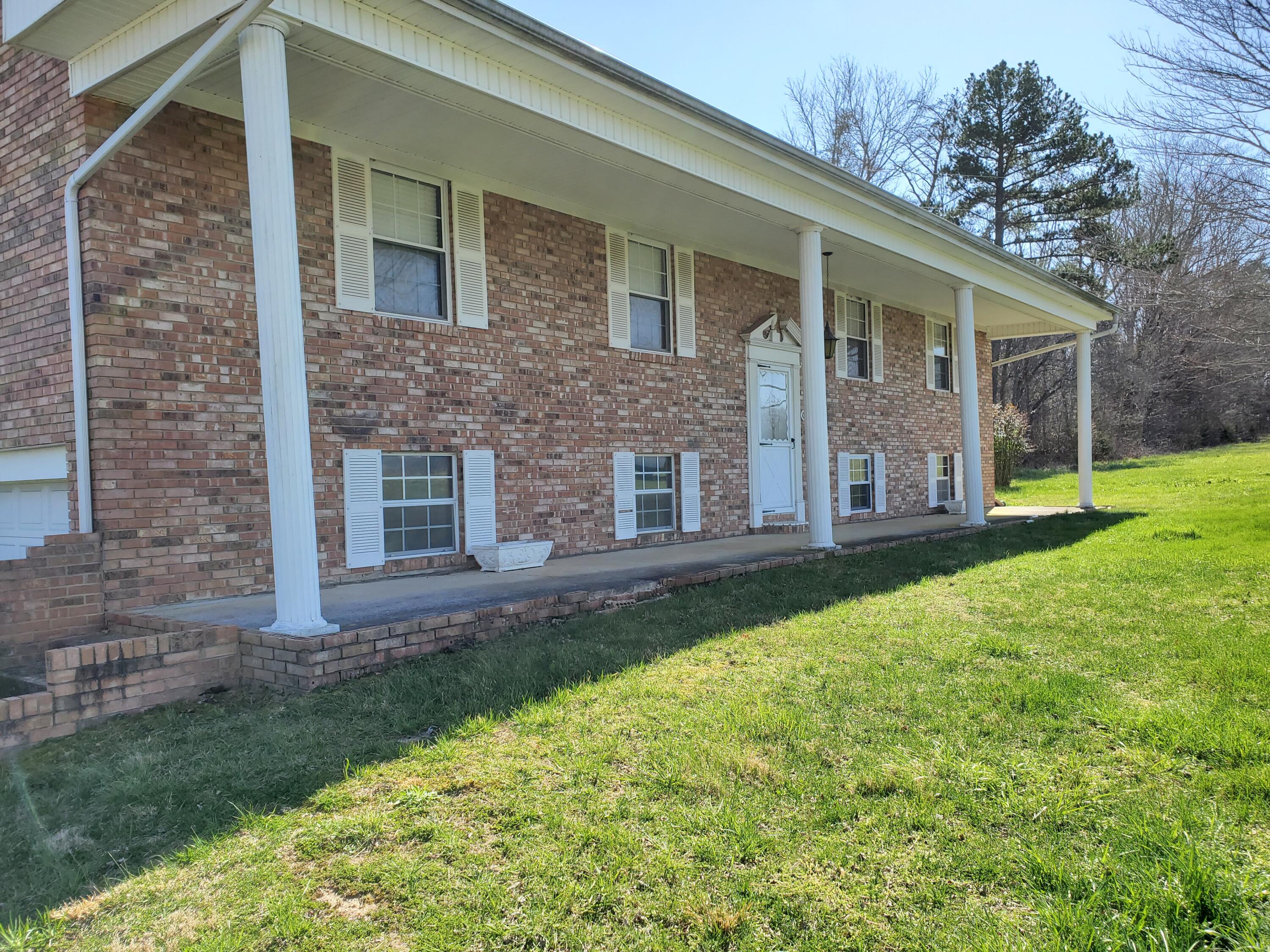 2010 McCoy Road Greeneville, TN 37743 - Photo 8 of 59 lt front porch