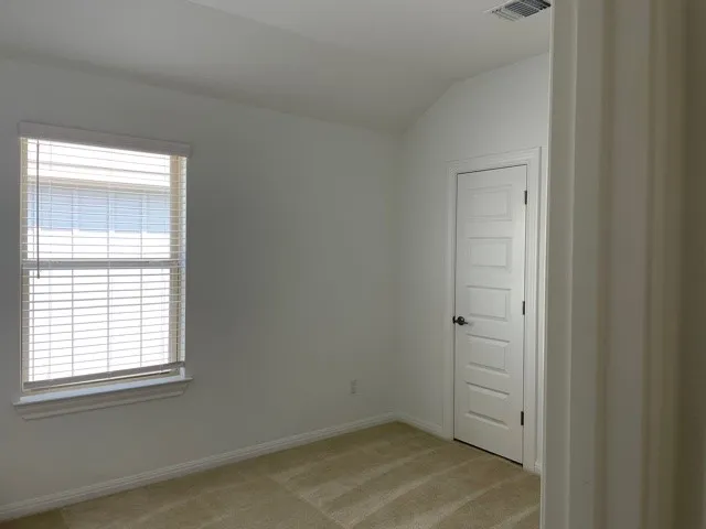 a bathroom with a sink toilet vanity and shower
