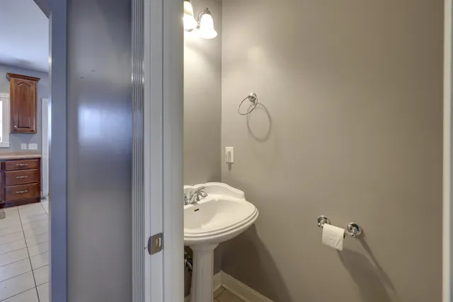 a bathroom with a sink and toilet