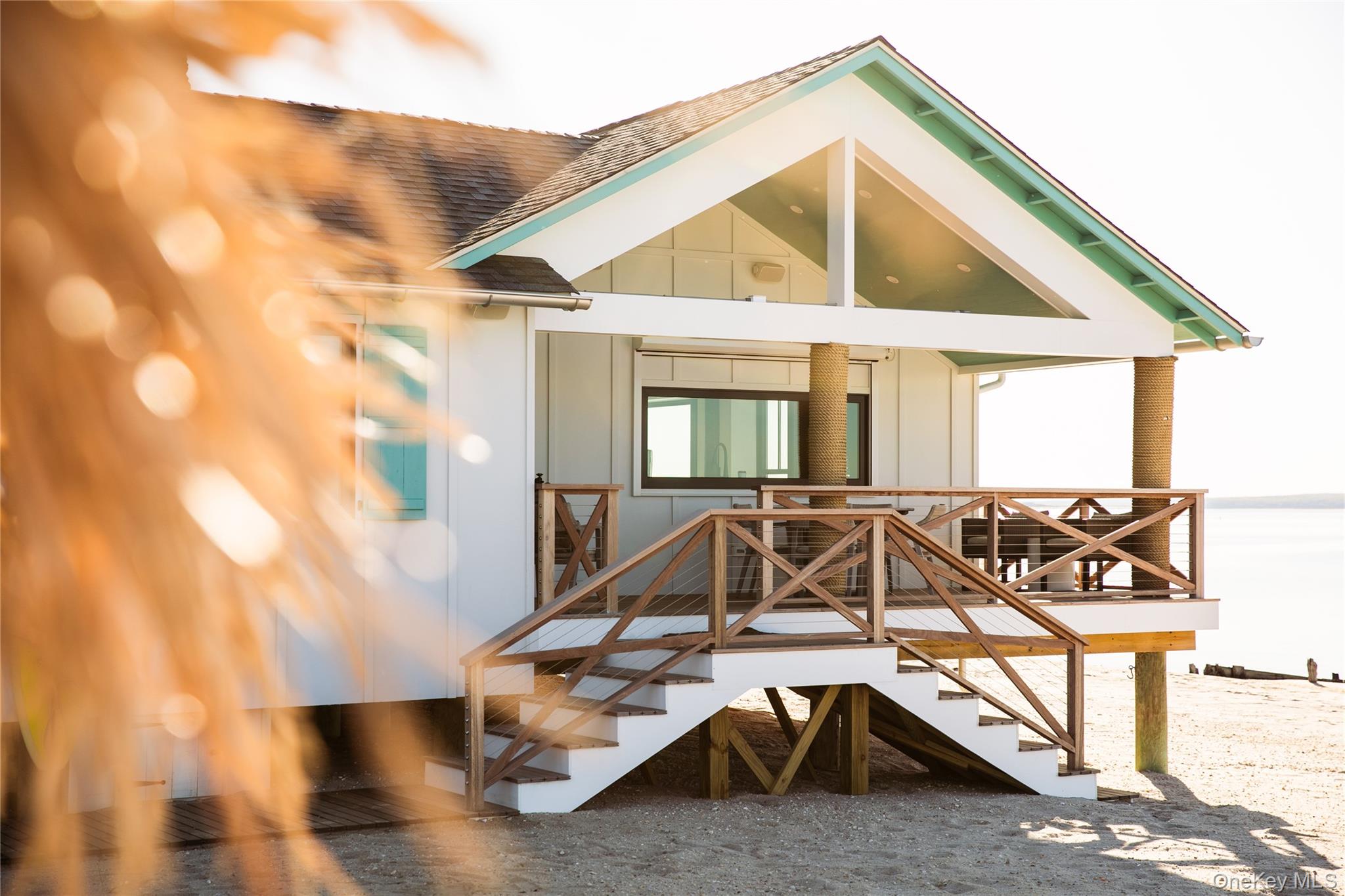 610 Park Avenue Mattituck, NY 11952 - Photo 15 of 23 a view of a house with wooden deck