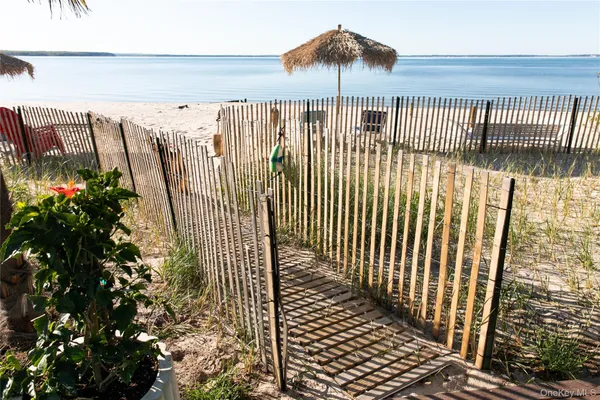 a view of a balcony with a pot