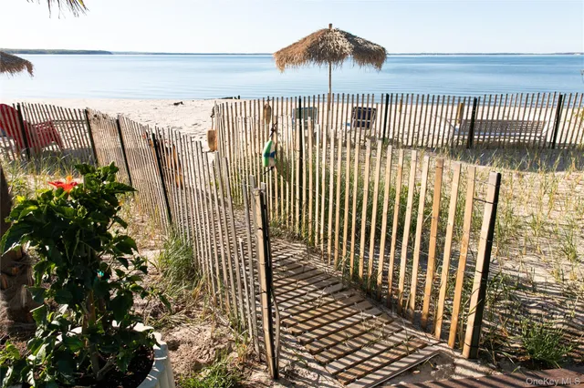 a view of a balcony with a pot