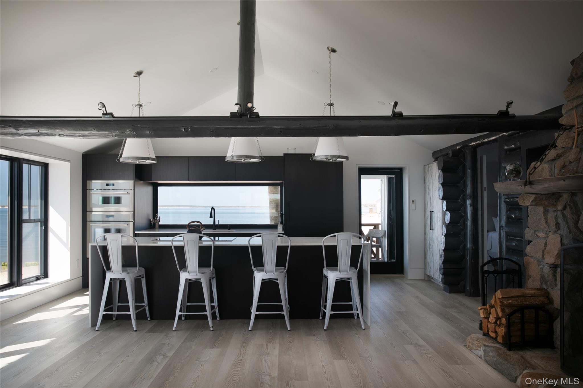 610 Park Avenue Mattituck, NY 11952 - Photo 9 of 23 a view of a dining room with furniture and wooden floor