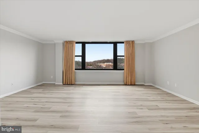 a bathroom with a sink toilet vanity and shower