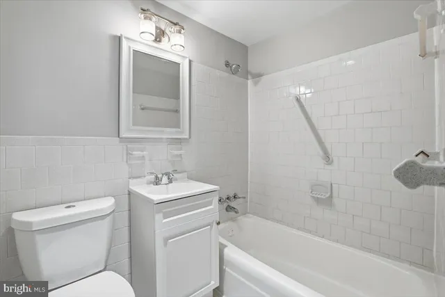 a bedroom with a bed and a closet