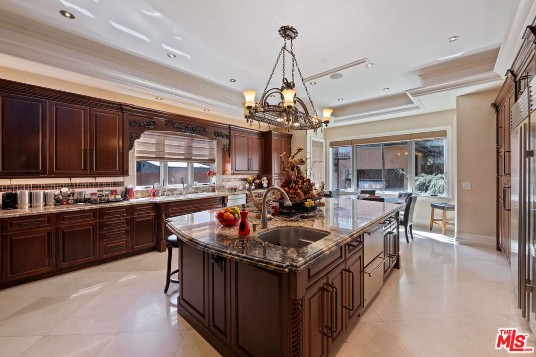 2023 Parnell Avenue Los Angeles, CA 90025 - Photo 14 of 59 a kitchen with kitchen island granite countertop lots of counter top space