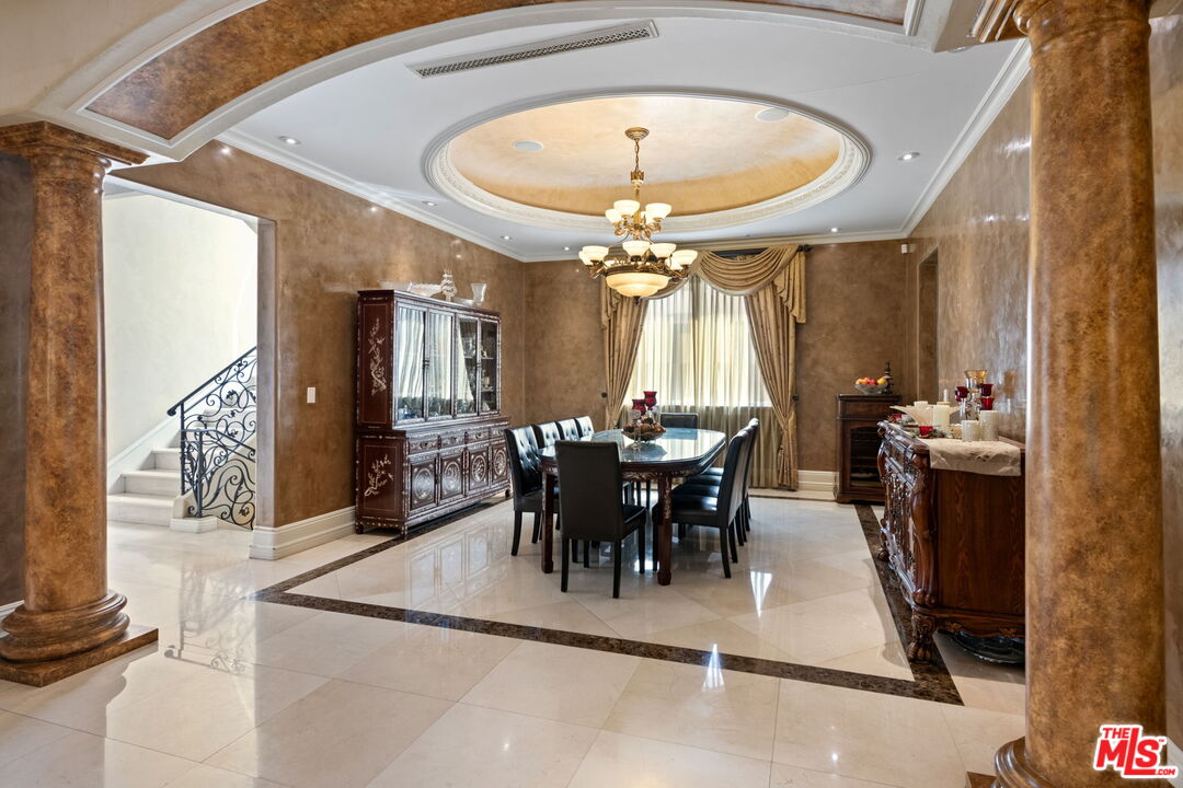 2023 Parnell Avenue Los Angeles, CA 90025 - Photo 20 of 59 a view of a dining room with furniture and chandelier
