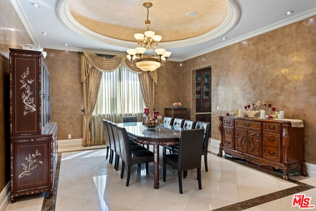 2023 Parnell Avenue Los Angeles, CA 90025 - Photo 21 of 59 a view of a dining room with furniture and chandelier