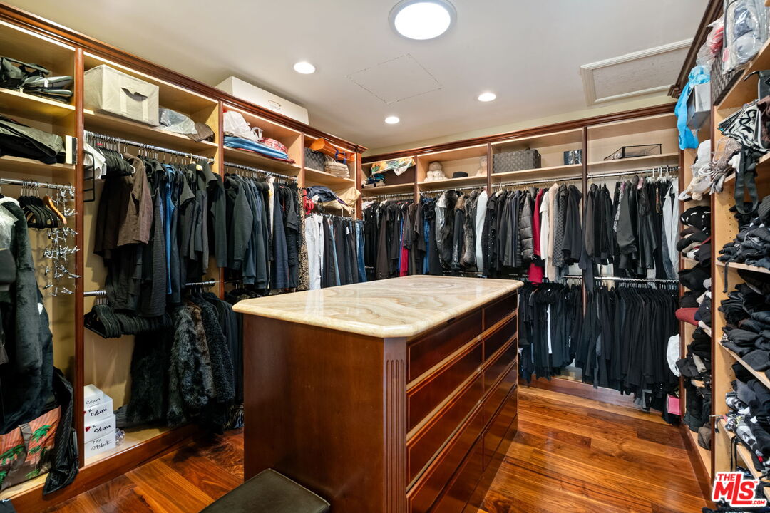 2023 Parnell Avenue Los Angeles, CA 90025 - Photo 37 of 59 a view of walk in closet with clothes
