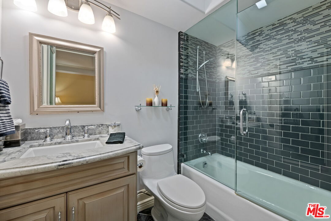 2023 Parnell Avenue Los Angeles, CA 90025 - Photo 49 of 59 a bathroom with a sink a toilet and shower