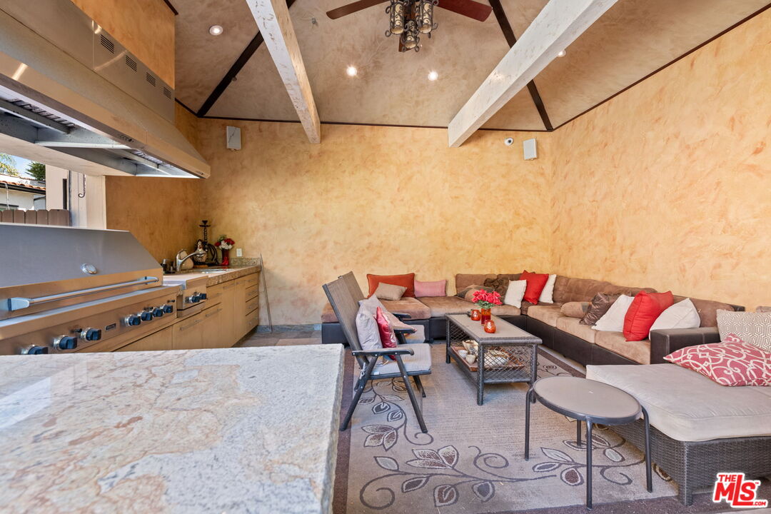 2023 Parnell Avenue Los Angeles, CA 90025 - Photo 59 of 59 a living room with furniture and a flat screen tv