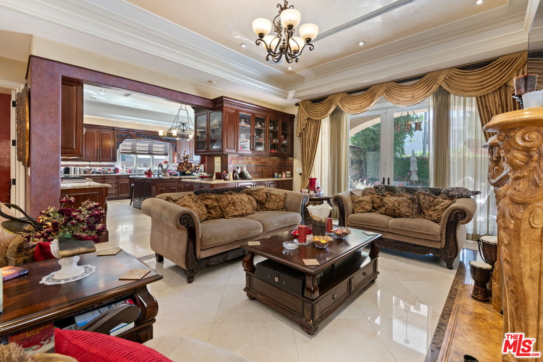 2023 Parnell Avenue Los Angeles, CA 90025 - Photo 10 of 59 a living room with furniture and a large window