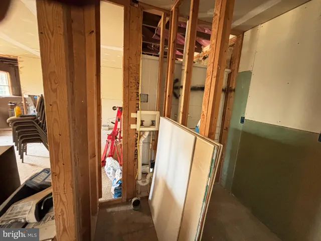 a view of a hallway with stairs