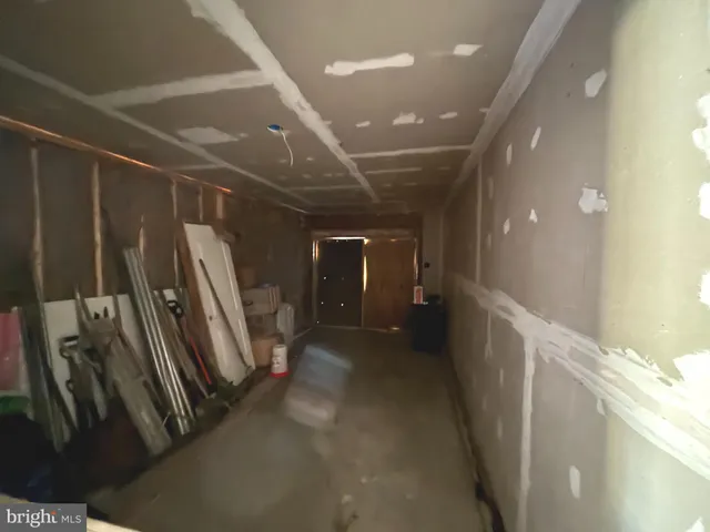a view of a storage & utility room with washer and dryer