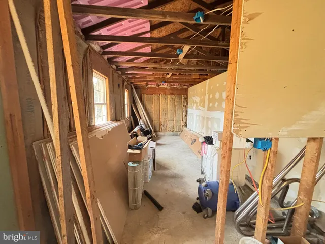 a living room with lots of furniture and a rug