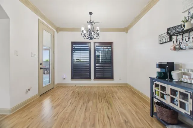 a view of livingroom with furniture and chandelier