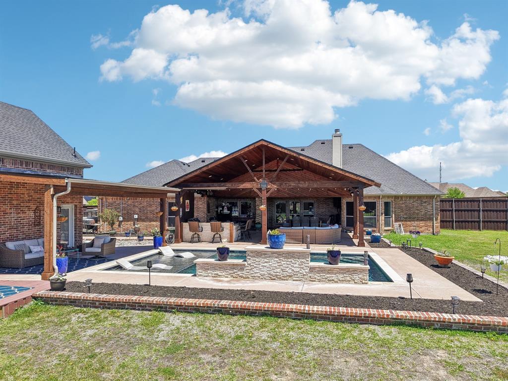 15110 Rutledge Lane Talty, TX 75126 - Photo 27 of 40 a outdoor space with lots of white furniture