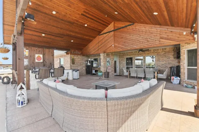 a large room with table and chairs