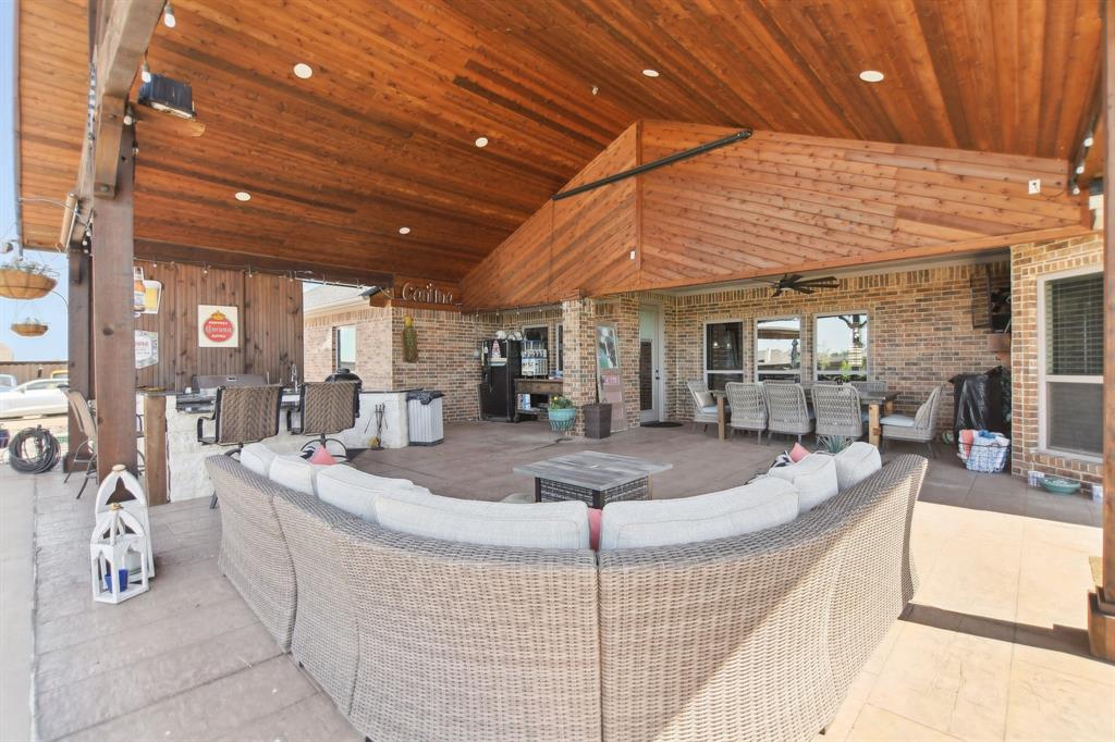 15110 Rutledge Lane Talty, TX 75126 - Photo 31 of 40 a large room with table and chairs