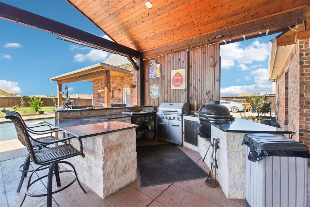 15110 Rutledge Lane Talty, TX 75126 - Photo 35 of 40 a view of a chairs and table in the patio