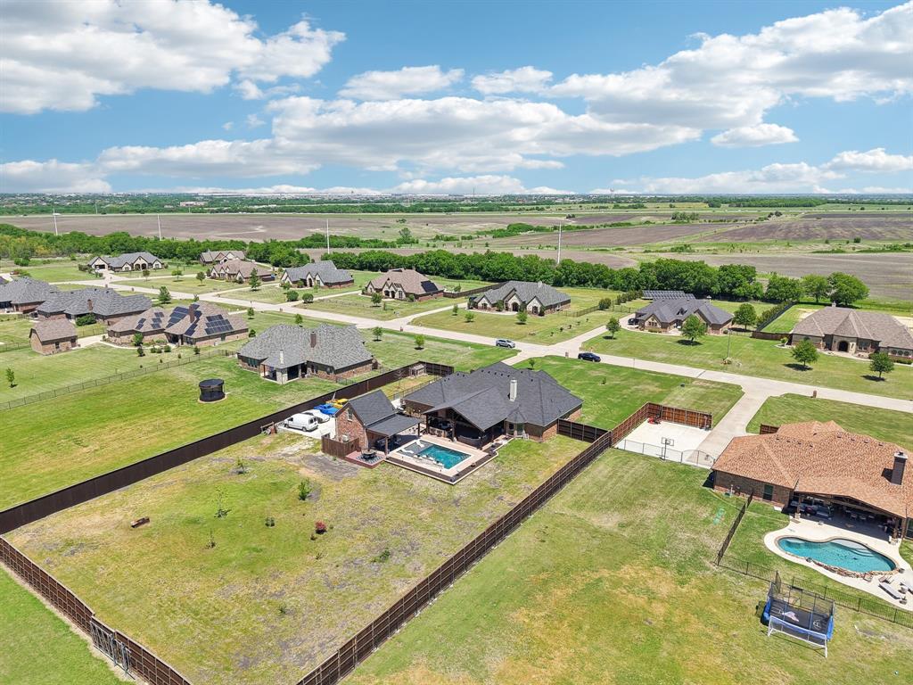 15110 Rutledge Lane Talty, TX 75126 - Photo 38 of 40 an aerial view of a pool patio swimming pool and outdoor seating