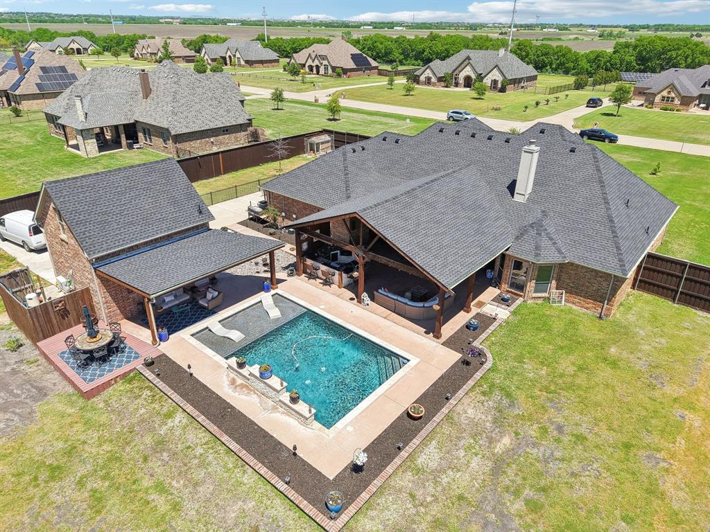 15110 Rutledge Lane Talty, TX 75126 - Photo 39 of 40 an aerial view of a house with swimming pool