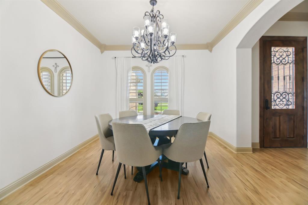 15110 Rutledge Lane Talty, TX 75126 - Photo 9 of 40 a view of a dining room with furniture window and wooden floor