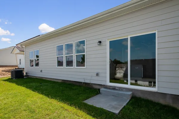 a view of a back yard of the house