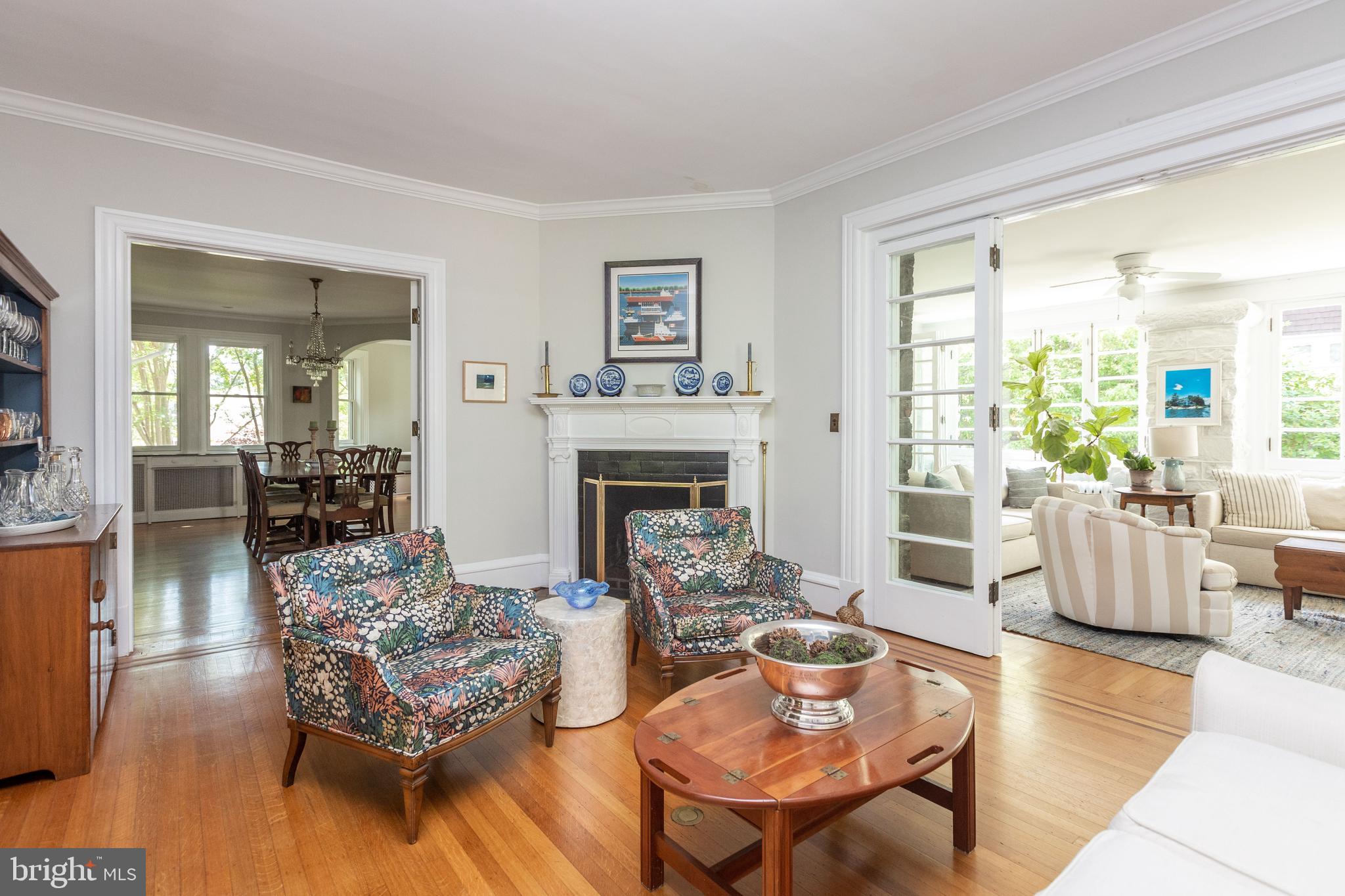 4711 Roland Avenue Baltimore, MD 21210 - Photo 14 of 68 a living room with furniture and a fireplace