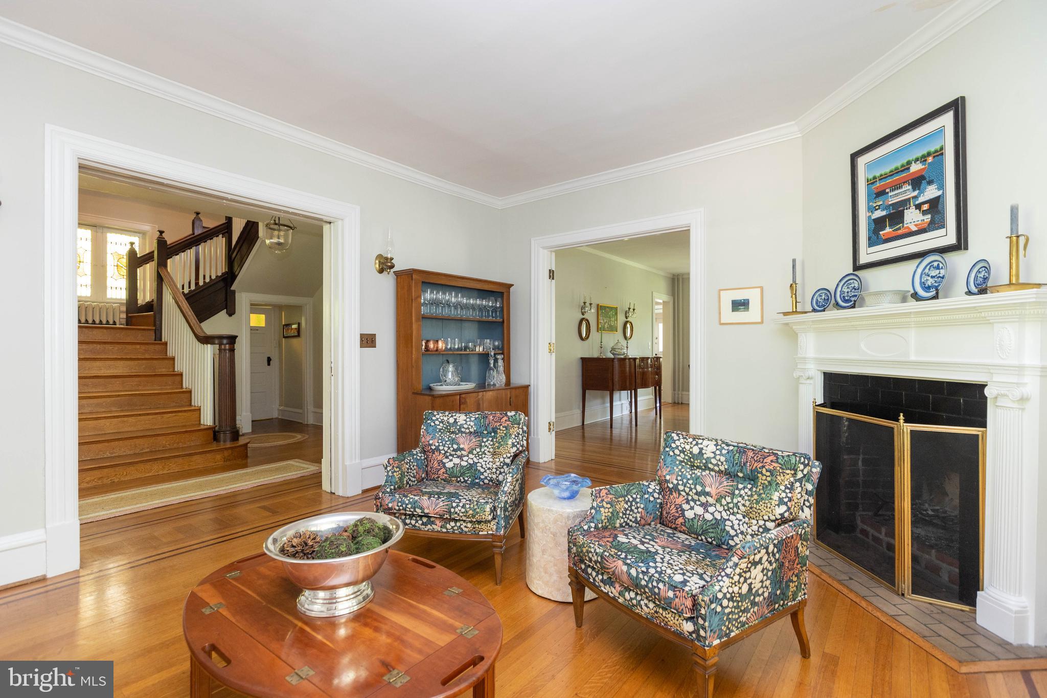 4711 Roland Avenue Baltimore, MD 21210 - Photo 17 of 68 a living room with furniture and a fireplace