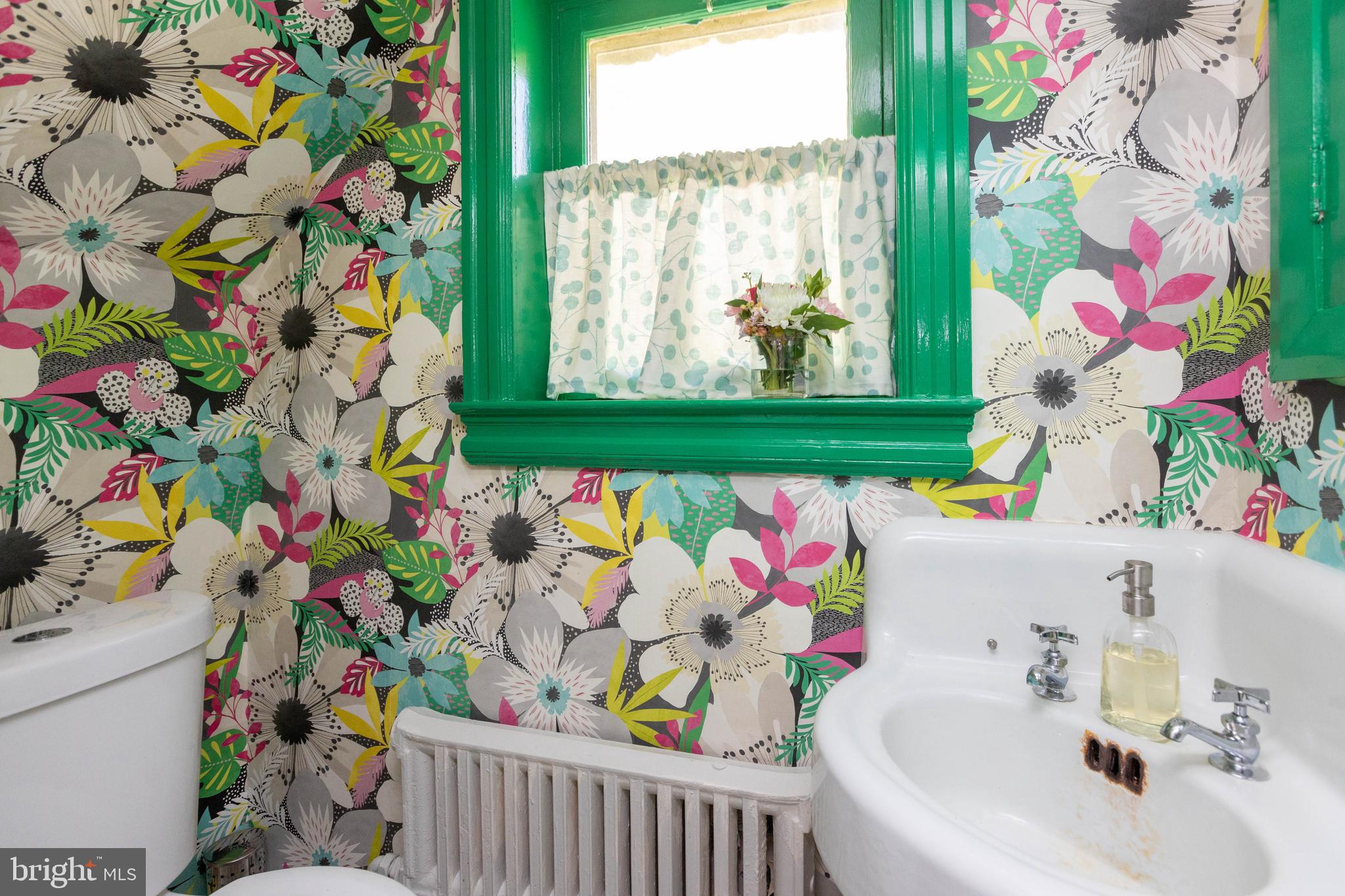 4711 Roland Avenue Baltimore, MD 21210 - Photo 32 of 68 a bathroom with a sink and a bathtub