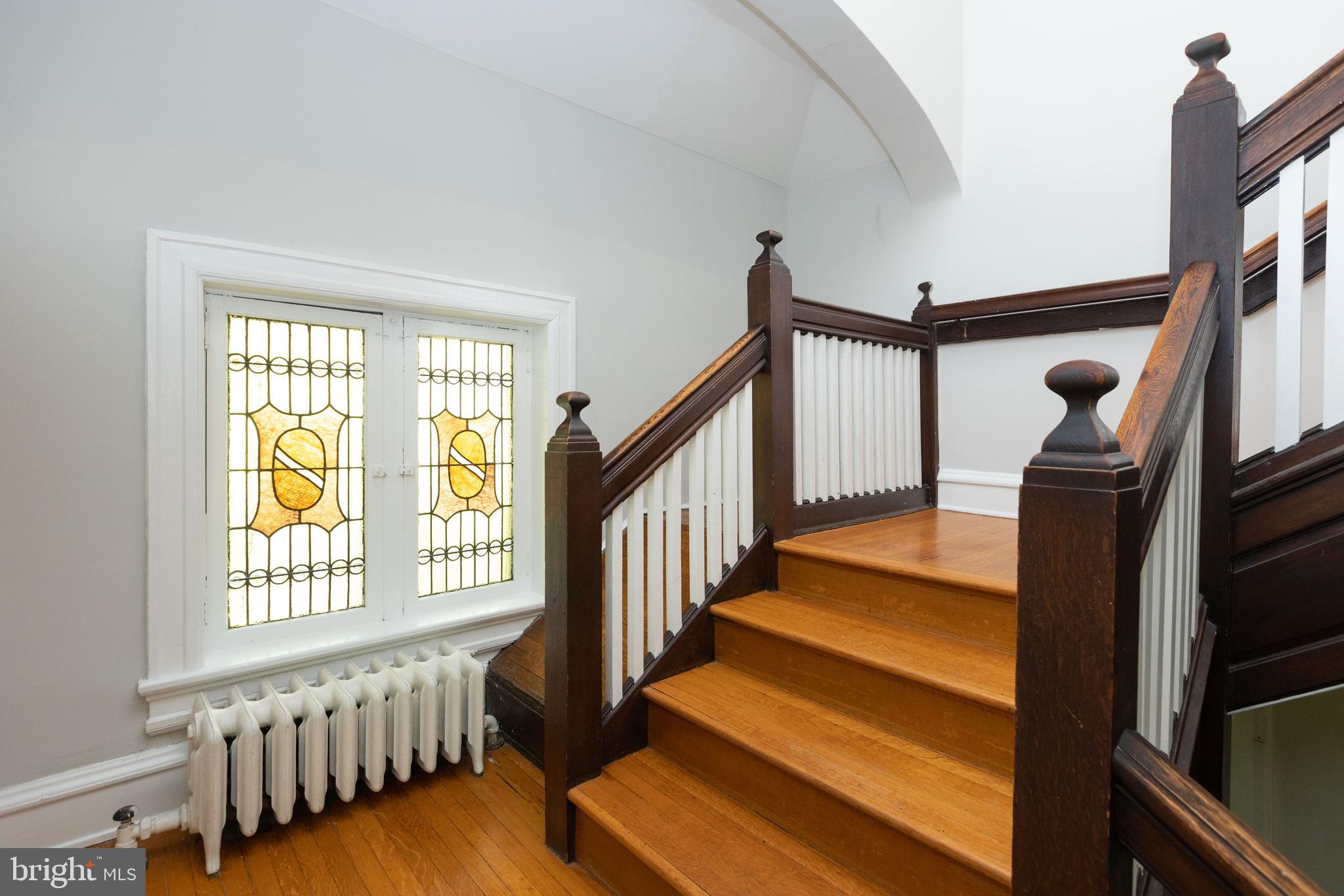 4711 Roland Avenue Baltimore, MD 21210 - Photo 34 of 68 a view of an entryway with wooden floor and windows