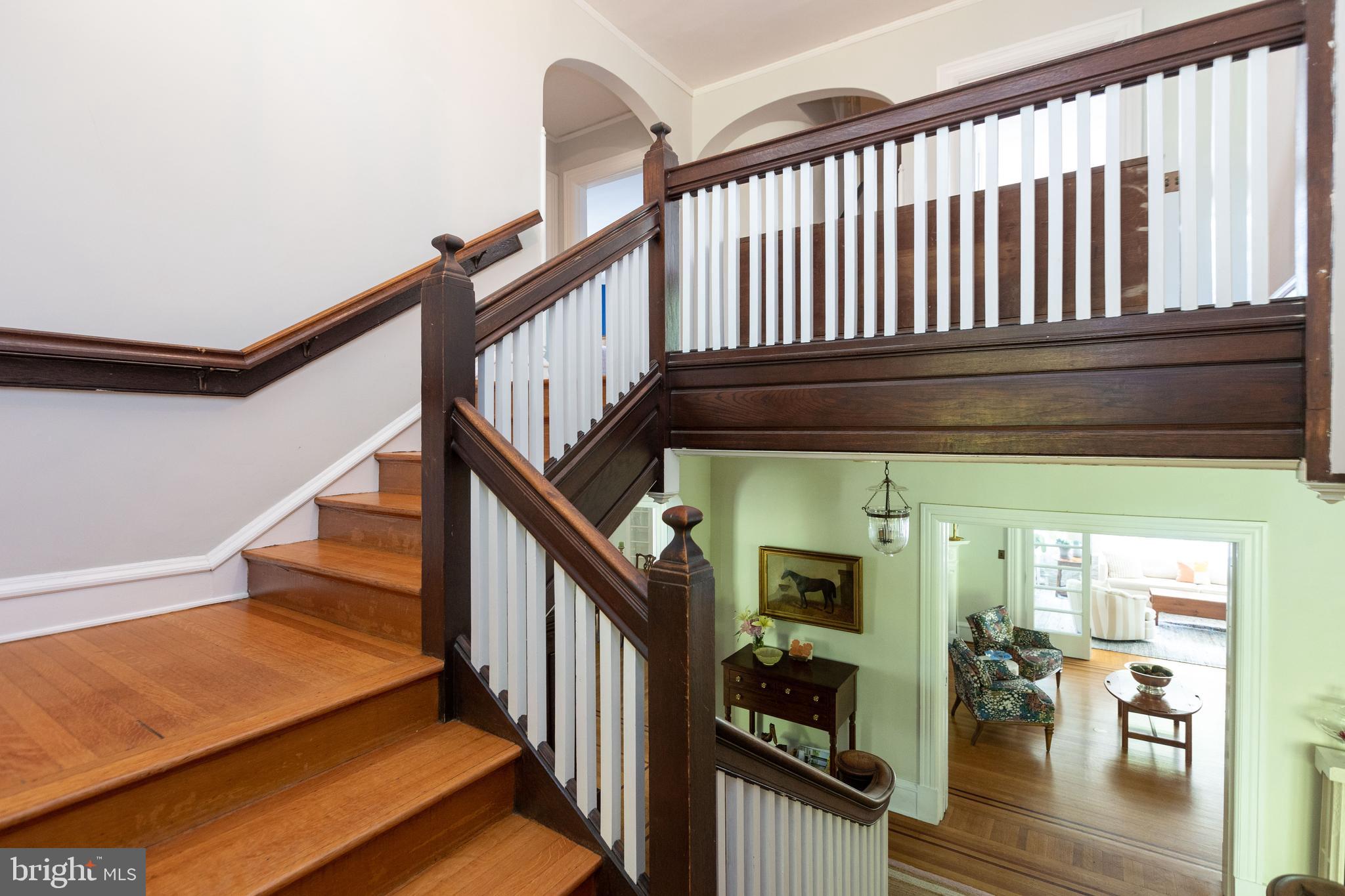 4711 Roland Avenue Baltimore, MD 21210 - Photo 35 of 68 a view of entryway and hall with wooden floor