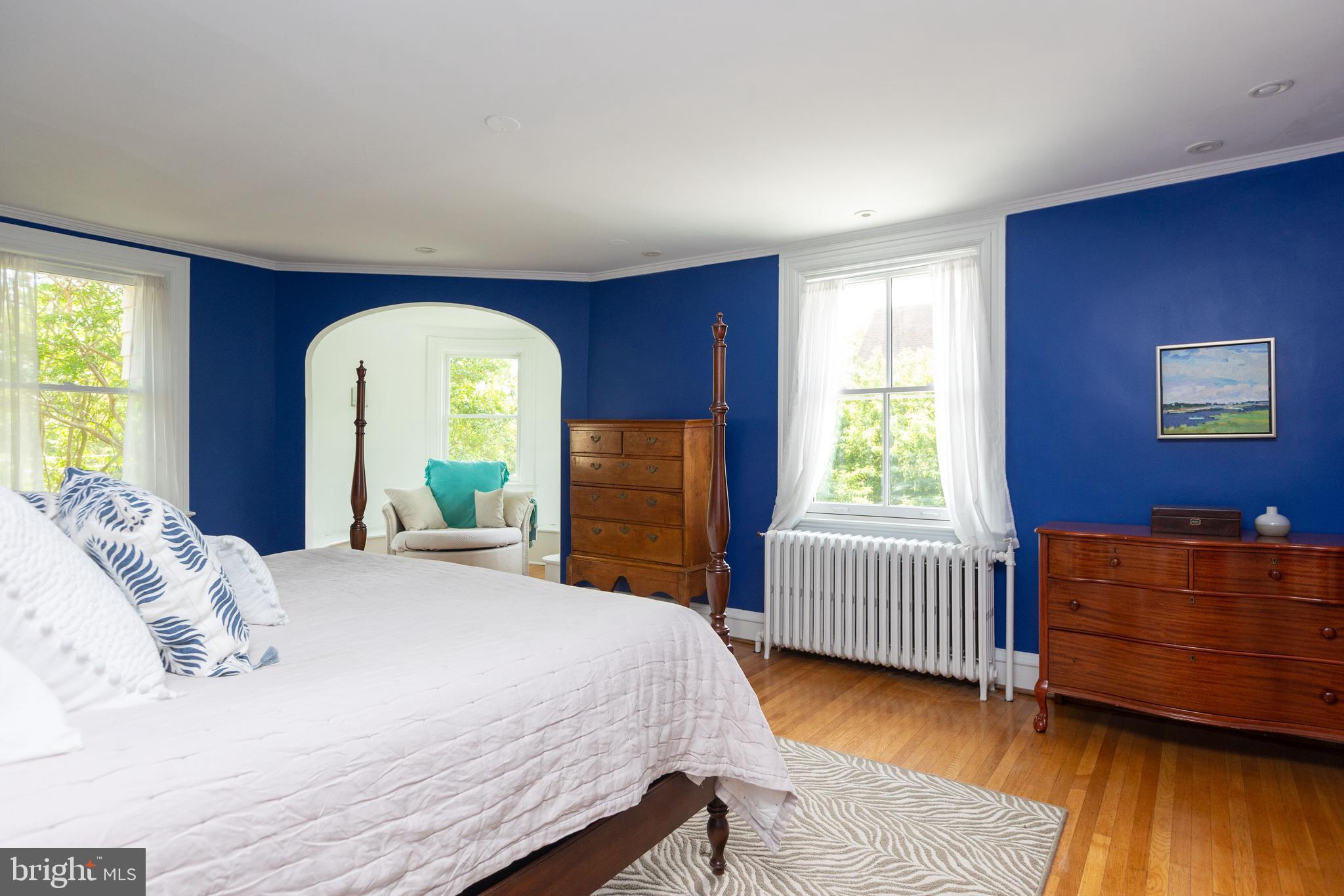 4711 Roland Avenue Baltimore, MD 21210 - Photo 37 of 68 a bedroom with a bed and a dresser