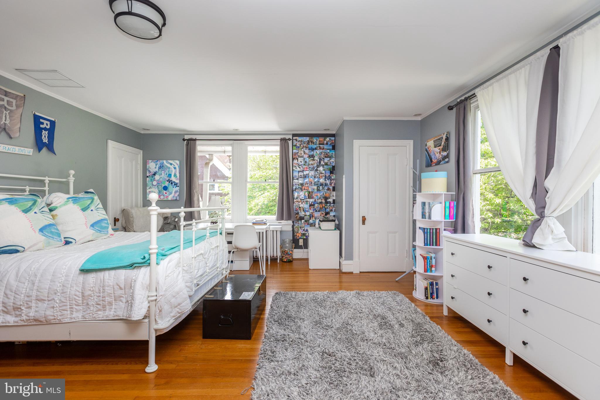 4711 Roland Avenue Baltimore, MD 21210 - Photo 42 of 68 a living room with furniture and a large window