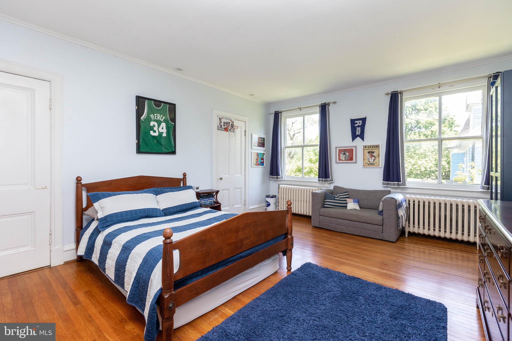 4711 Roland Avenue Baltimore, MD 21210 - Photo 46 of 68 a bedroom with double bed furniture and a window