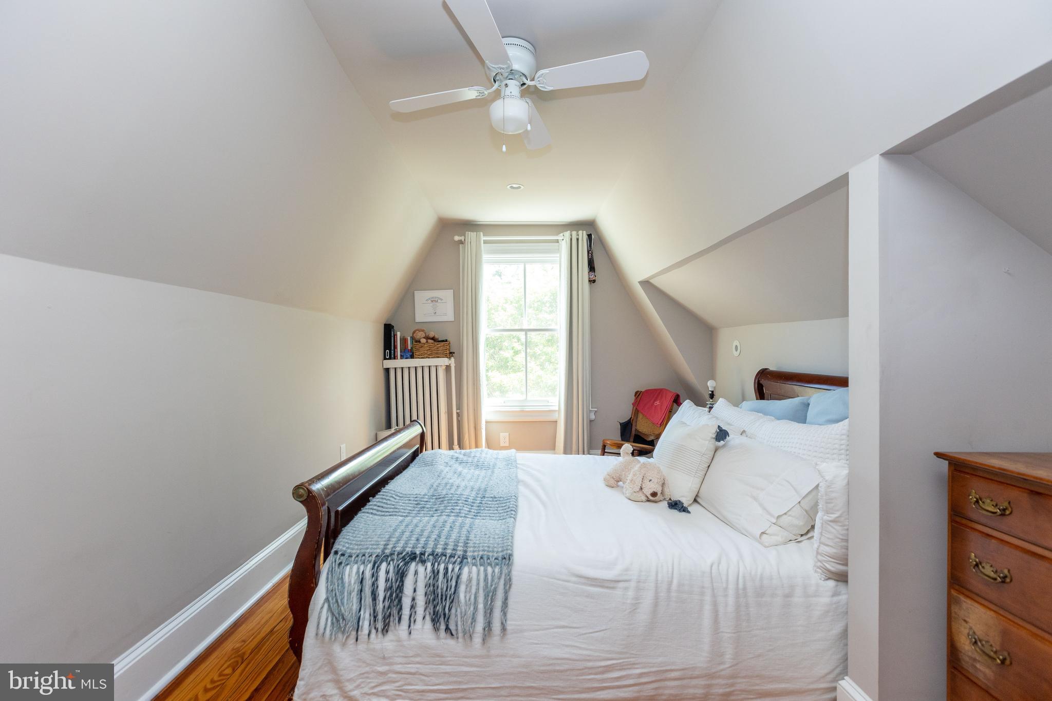 4711 Roland Avenue Baltimore, MD 21210 - Photo 55 of 68 a bedroom with a bed and a window