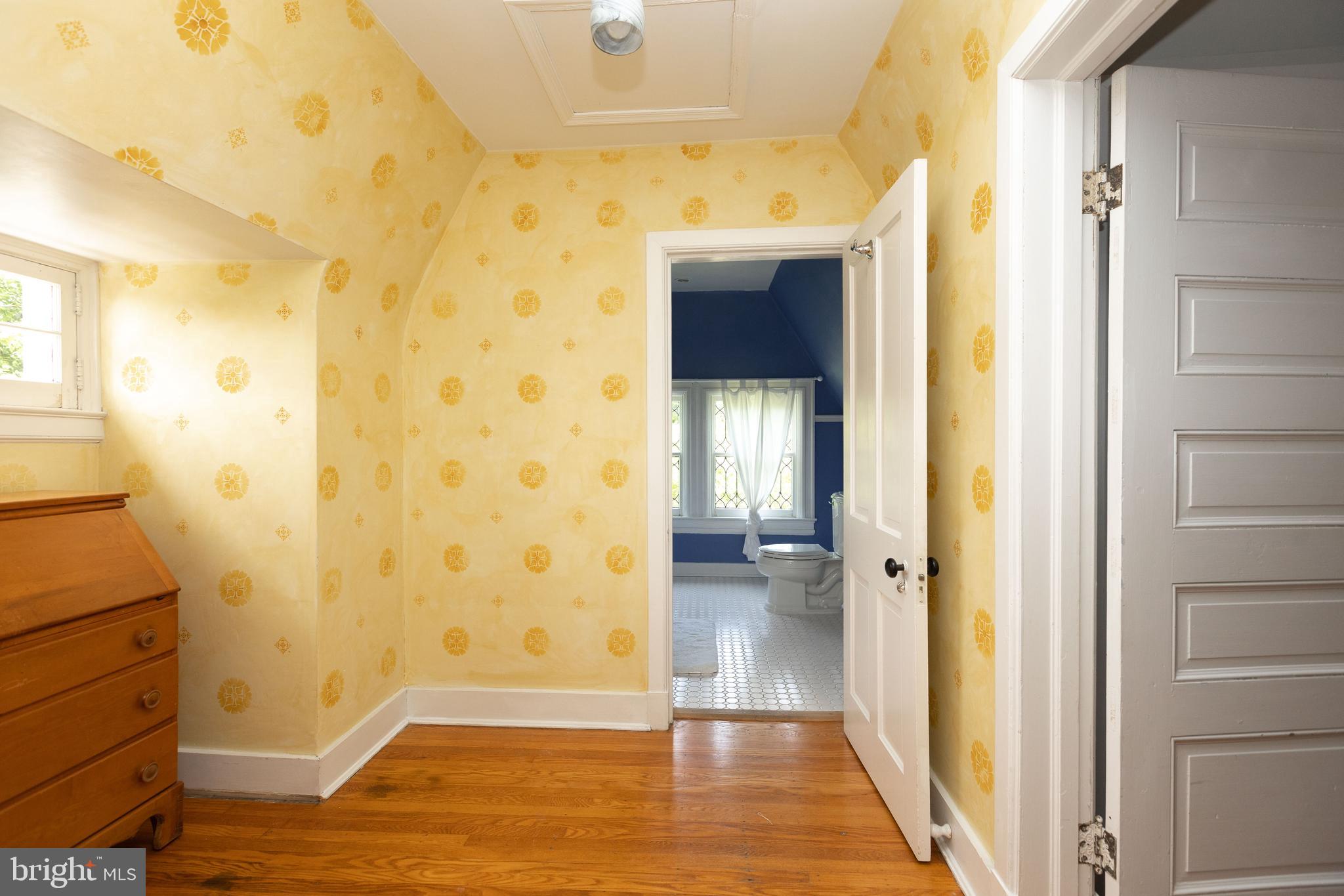4711 Roland Avenue Baltimore, MD 21210 - Photo 58 of 68 a view of a bathroom with a glass door shower