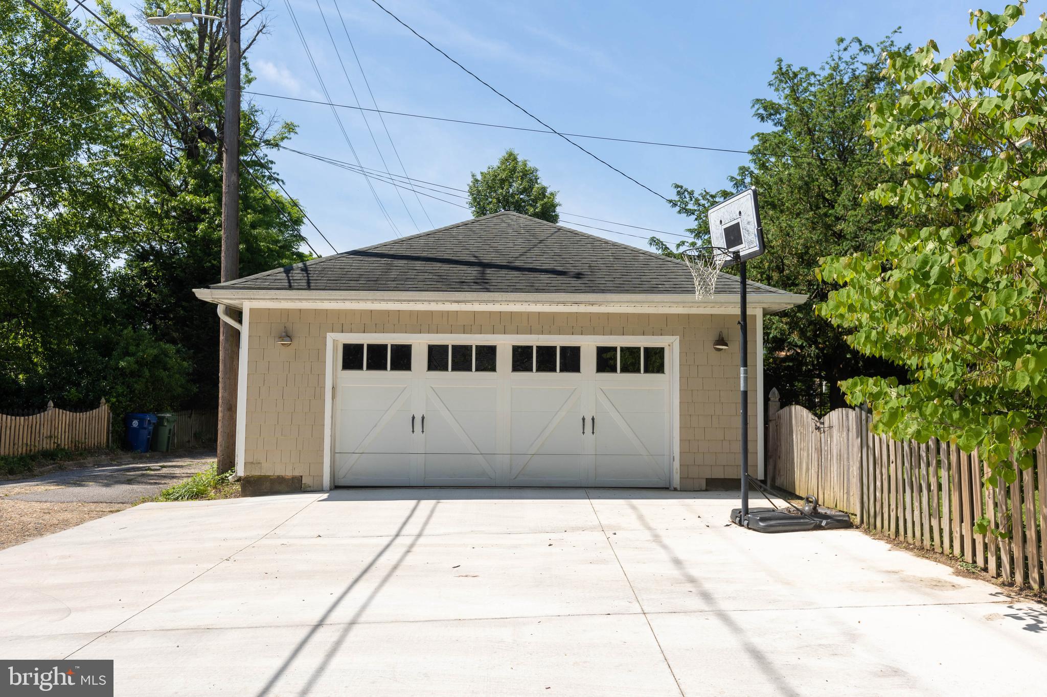 4711 Roland Avenue Baltimore, MD 21210 - Photo 66 of 68 a front view of a house with a yard